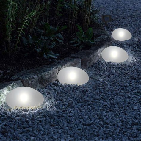 PRICES MAY VARY. Set of 4 Solar Pebble Lights: Design in stone shape, these decorative solar lights include cool white LEDs cast for safe, soft and mood-enhancing glow. Decorate your garden with these modern solar outdoor pebble lights. Dusk to Dawn: These stone lights will automatically turn on the light at dusk (ensure the switch is in “ON” position) and automatically charge during the day. The time of working and charging depends on the sunlight. Material & Dimension: Made of glass top and pl Solar Tree Lights, Solar Tree, Decorative Solar Lights, Rock Lights, Solar Lawn Lights, Glow Stones, Solar Garden Lights, Solar Pathway Lights, Lights Design