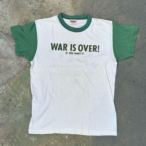 @madcapmysteriesvintage on Instagram: "SOLD War Is Over If You Want It Dm for inquiries . . #thrift #vintage #vintageforsale #foundongrailed #grailed #80s #bandtee #vintagetee #70s #vintagedenim #60s #hippy #vintagesweatshirt #vintagelevis #vintageclothingforsale #1960s #mod #1970s #vintagetees #vintageclothesforsale #hiddenny #hippy #rocknroll #woodstock #highsnobiety #1960sfashion #1970sfashion #1980sfashion #vintagefashion #curatedvintage" Vintage Tshirts 70s, 70s Tshirt, Hippie Tshirt, Beatles Vintage, 1980’s Fashion, 1960’s Fashion, Masc Fashion, The Baby Sitters Club, Black Anime Guy