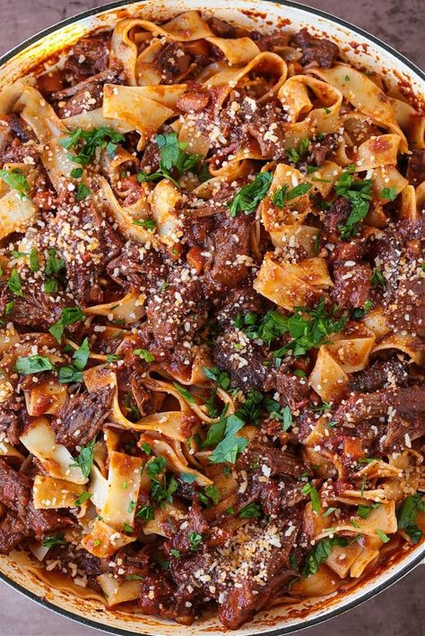 This beef short rib ragu recipe is rich, hearty, and comforting, with tender meat, fresh herbs, and thick pappardelle pasta. Braised Short Rib Ragu, Meaty Appetizers, Short Rib Ragu, Winter Pasta, Beef Short Rib Recipes, Beef Ragu, Ragu Recipe, Pappardelle Pasta, Short Ribs Recipe