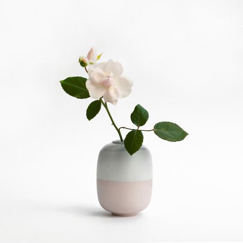 Small ceramic vase, ideal for showcasing a single flower or a small bouquet. It enhances any space, whether displayed on its own or accompanied by a stem of greenery or a matching bunch of flowers, accentuating their natural colors and revealing the beauty of simplicity. The vase is glazed all over on the inside, allowing you to use it not only for water but also for oils, for example as a home fragrance diffuser bottle. A secret feature lies within: a small cylinder attached to the base allows even a long single flower to stand straight and neat (see, how on the photo #3 the flower is almost three times longer than the vase itself, yet it stands up straight). Dimensions: height - 11 cm (4.5 inch), diameter - 9 cm (3.5 inch), weight - 250g (9 oz). The inside and top part of the outside are Pastel, Small Vase Of Flowers, Modern Shelf Decor, Flower Bouquet Vase, Nordic Vase, Bouquet Vase, Diffuser Bottle, Modern Shelf, Vase Handmade