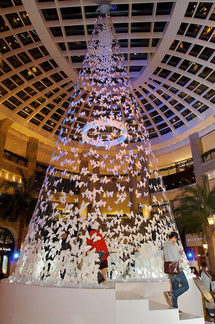 Bellavita Christmas Installation - icy butterflies Christmas Installation, Mall Decor, Christmas Idea, Unique Christmas Decorations, Unique Christmas Trees, White Christmas Trees, Light Night, Christmas Tree Ideas, Christmas Tree With Gifts