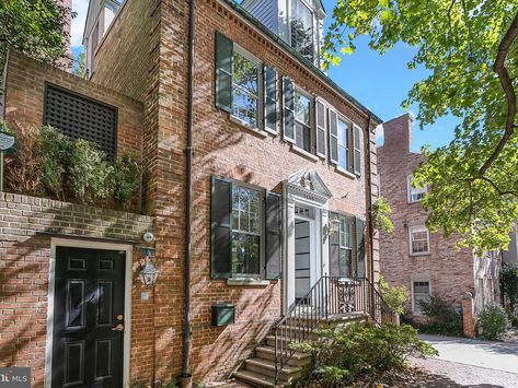 Washington Dc Houses, Community Leadership, Hope Diamond, Privacy Plants, Double French Doors, Brick Facade, Elegant Dining Room, Natural Sunlight, Colonial House