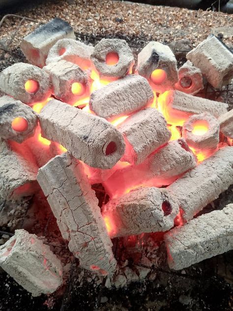 Charcoal briquettes that Cook Culinaryhave been heated until they are red stock photography Charcoal Briquettes, Coconut Shells, Coconut Shell, Stock Photography, Grilling, Photo Image, Shells, Coconut, Heat