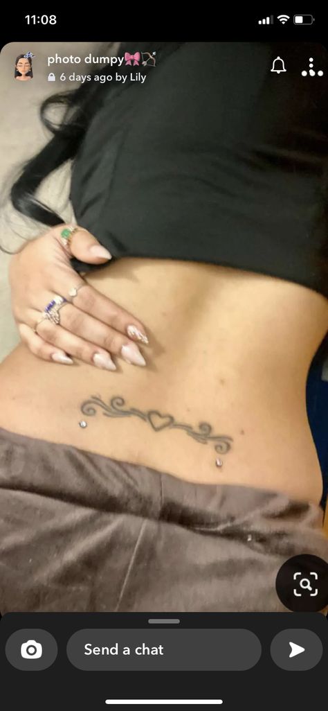 Dermal Tattoo Ideas, Lower Back Tattoos With Dermal Piercing, Spine Tattoos With Back Dermals, Back Dermals With Tattoo, Surface Back Piercing, Lower Back Dermals, Back Dimple Piercing With Tattoo, Lower Back Percinings, Lower Back Piercings