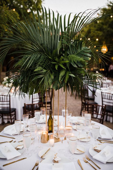 Wedding Jungle Theme, Miami Wedding Color Palette, Tall Vases Palm Leaves Wedding Tables, Tommy Bahama Wedding, Dark Green Tropical Wedding, Jungle Wedding Flowers, Emerald Black White Wedding, Tropical Wedding Reception Table, Palms Wedding Decor