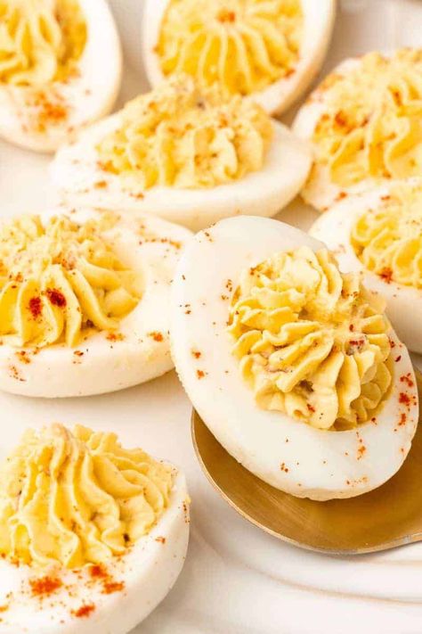 Try these Million Dollar Deviled Eggs at your next party for the perfect finger food. They are easy to make and can be prepared ahead of time, making them a convenient and stress-free appetizer. The secret to these delicious deviled eggs is the combination of creamy mayonnaise, tangy Dijon mustard, and crispy bacon! Easy Devil Eggs 4 Ingredients, Million Dollar Eggs, Deviled Eggs Dijon Mustard, Deviled Eggs With Dijon Mustard, Sweet Deviled Eggs, Mustard Deviled Eggs, Million Dollar Deviled Eggs, Deviled Eggs Recipe Best, Buffalo Deviled Eggs