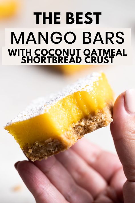 A hand holding up a mango bar with a bite taken out of it with the words "the best mango bars with coconut oatmeal shortbread crust" in the foreground Recipes Using Mango Puree, Mango Baking Recipes, Recipes With Mango Puree, Quick Mango Dessert, Healthy Mango Dessert Recipes, Mango Puree Recipe Desserts, Healthy Mango Recipes, Mango Puree Recipe, Oatmeal Shortbread