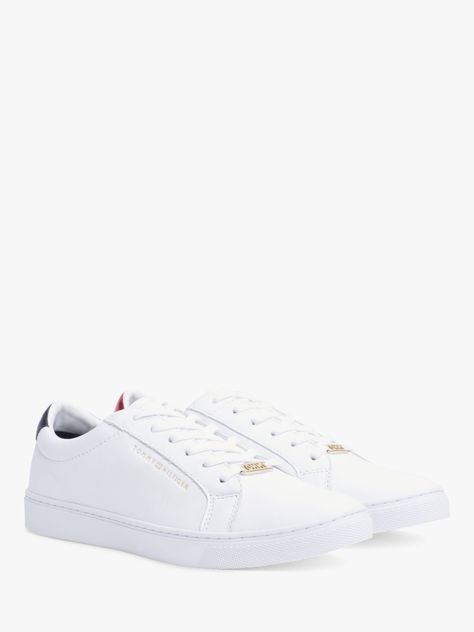 Crisp white kicks? Add these to your collection. The Tommy Hilfiger Essential Trainers boasts a white leather upper with a metallic red accents. This court kick is finished with branding throughout. Tommy Hilfiger Shoes Women, Tommy Hilfiger White Sneakers, Trendy Shoes Sneakers, Best Casual Outfits, White Kicks, Tommy Hilfiger Shoes, Trainers Fashion, Trainer Heels, Classic Shoes