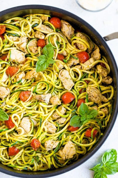 This quick weeknight recipe pairs zucchini noodles with chicken, tomatoes and pesto. It's a delicious and healthy meal the whole family will enjoy. #zoodles #zucchininoodles #pesto #chicken #lowcarb #glutenfree #zucchini #eatingbirdfood Noodle And Chicken Recipes, Noodles And Chicken Recipes, Noodles And Chicken, Zoodles With Chicken, Zucchini Noodles With Pesto, Pesto Zucchini, Pesto Zucchini Noodles, Bright Line Eating Recipes, Endo Warrior