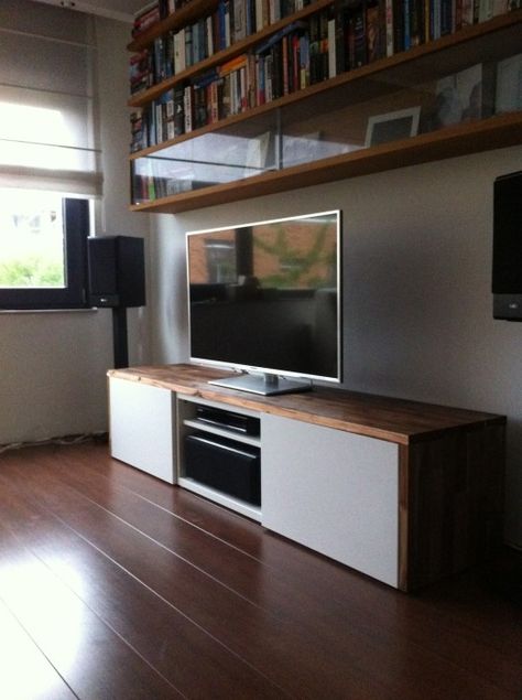 Stylish TV audio cabinet - IKEA Hackers Besta TV unit with Acacia on top. Could do with Walnut veneer or the Pax Door? Tv Cabinet Ikea, Low Tv Cabinet, Floating Tv Cabinet, Audio Cabinet, Stereo Cabinet, Flat Screen Tv, Ikea Besta, Ikea Hackers, Tv Furniture