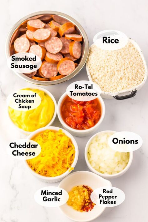 Cheesy Sausage and Rice Casserole One Pot Smoked Sausage And Rice, Rice Sausage Skillet, Crockpot Meal With Kielbasa, One Pot Smoked Sausage Recipes, Easy Dinner With Sausage Links, Kielbasa And Rice Casserole, Meals With Beef Sausage, Sausage Andouille Recipes, Egg Noodle And Sausage Recipes