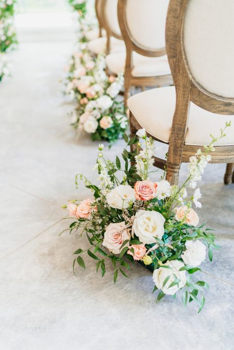 Blush florals details during ceremony Ceremony Aisle Floral Arrangements, Chair Arrangement Wedding Ceremony, Large Flower Centerpieces Wedding, Wedding Ceremony Aisle Florals, Blush Pink Wedding Ceremony, Wedding Aisle Floral Arrangements, Ceremony Chair Flowers, Aisle Arrangements Wedding Ceremony, Aisle Florals Wedding