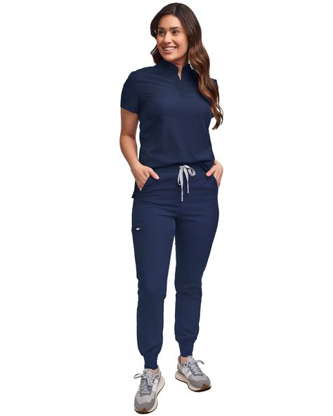 PRICES MAY VARY. 93% Polyester, 7% Spandex Imported Drawstring closure Machine Wash SLIM FIT JOGGER: This scrub set is a must-have essential! The jogger pant comes with a modern slim fit, contrast drawstring, and an elastic waist band. Ideal for the medical field, the slim fit jogger features 4 roomy pockets to help keep your items secure while completing tasks throughout the day. Dress this jogger pant up or down, perfect for working out or lounging around on your days off. You'll love the vers Nurse Pants Outfit, Jogger Scrub Pants, Women’s Scrubs, Nurse Fits, Beauty Therapist Uniform, Scrubs Style, Scrubs Uniform Cute, Nursing Aesthetic, Scrub Outfits