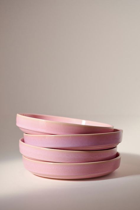 Thoughtfully made in Portugal, each piece of our Ginny stoneware collection is finished with a reactive glaze with slight variations that honor the uniqueness of hand-thrown ceramics. Through years of use, the distinct hues of the stoneware’s dips and valleys develop even more, creating a one-of-a-kind piece. | Ginny Pasta Bowls by Anthropologie in Pink Size: Set of 4 bowl Anthropologie Bowls, Kitchenware Aesthetic, Aesthetic Bowls, Pink Tableware, Anthropologie Bowl, Beachy House, Style Californien, Thrown Ceramics, Anthropologie Kitchen