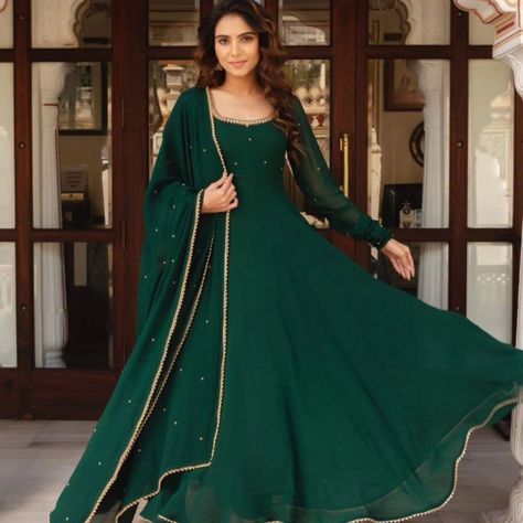 *GREEN HANDWORK ANARKALI 💚🌸✨* for order what's app 7997018094 Price 1299/- Be The Talk Of The Town With This Beautiful Handwork Anarkali With Dupptta! This piece is made from Fox Georgette Fabric with a beautiful intricate motif zari Handwork, creating an elegant and eye-catching look. The Dress is the perfect way to make a statement and show off your impeccable sense of style. Get your hands on this must-have set and elevate your wardrobe to the next level! *DETAILS* ✓Material:- Fox Ge... Flowy Outfits, Indian Long Dress, Haldi Outfits, Women Suits Wedding, Bridesmaid Lehenga, Hand Embroidery Work, Mehendi Outfits, Reception Lehenga, Gown With Dupatta