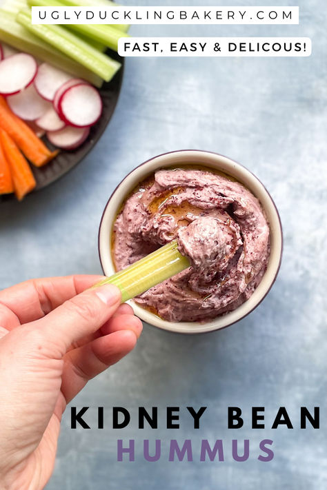 hand holding celery dipped into red kidney bean hummus next to plate with celery, carrots, and radishes with title of kidney bean hummus and subtitle fast, easy, and delicious. Red Bean Hummus, Beans For Thanksgiving, Kidney Bean Hummus, Kidney Bean Dip, Canned Kidney Beans, Recipe For Hummus, Gluten Free Snacks Recipes, Salad Bowl Recipes, Classic Hummus