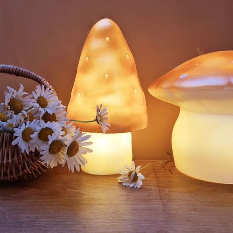 This night light Medium Mushroom Gold opens a world of soft dreams. It will help the little ones to fall a sleep and alight or not, it is a nice decorative object. When illuminated, it will spread a soft and veiled light. Traditonally made and handpainted in Germany. #nightlights #lights #heico #mushroom #lampechamignon #madeingermany #egmonttoys #vintage #decoration #gold Small Mushroom, Egmont Toys, Baby Room Themes, Nursery Night Light, Whimsical Home, Dream Land, Nursery Room Inspiration, Kids Night, Night Light Kids