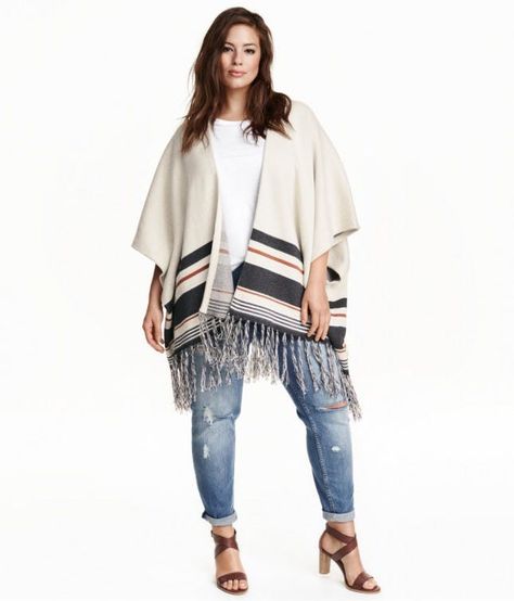 17 Rad Plus-Size Statement Pieces for Festival Season | Brit + Co Big Girl Clothes, Festival Essentials, Ashley Graham, Knitted Poncho, Alpaca Wool, Festival Season, Alpaca, White Stripe, Kimono Top