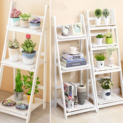 Product Details 3/4 Tier Flower Plant Pot Shelf Stand Display Ladder Garden Rack Step Style Wooden Feature * The natural wood colour to complement existing decor. Contemporary and stylish design to suite the right combination for your garden pots. * Made of high quality wood with careful processing, stable and solid. * Adopting environmentally friendly painting method, smooth surface, avoiding the inconvenience while cleaning and wiping. * Multiple slats splicing design can filter the water on rack caused by everyday watering, obvious layering, looks simple and comfortable. * With the foldable design feature, it can be put away when you don't use it. * Suitable for conservatories, balconies or small yards, this three-tier planter offers a sturdy and durable platform for flowers, foliage, h Ladder Garden, Display Ladder, Pot Shelf, Shoe Storage Unit, Garden Rack, Garden Plant Stand, Display Books, Wooden Plant Stands, Wooden Ladder