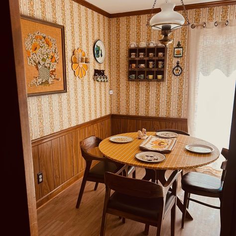 I’ve realized one of the things I’m missing to bring home the 70s style is a lot of plants. 🪴 Home decor | vintage vibes | groovy | hippie | flower power | seventies | thrifted home | wood paneling | mushrooms | crewel | embroidery | dining room | kitchen | yellow | mustard | wallpaper 70s Wainscoting, Groovy Dining Room, 1920 Dining Room, 70s Paneling, 70s Wood Paneling, 1970s Aesthetic Home, 70s Dining Room, 1970s Dining Room, 70s House Decor