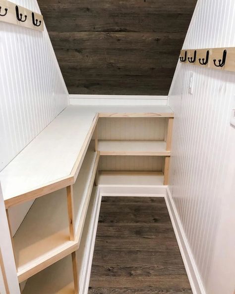 11 Ways To Maximize The Space Under The Stairs – Forbes Home Open Staircase Storage, Kitchen Cupboard Under Stairs, Narrow Under Stairs Storage, Under Stairs Closet Organization Sloped Ceiling, Deep Under Stairs Closet, Under Stairs Pantry Shelving Ideas, Above Stairs Storage, Understands Storage, Under The Stairs Laundry Room