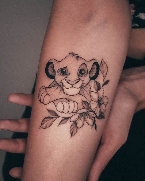 Lion King Tattoo. Disney Tattoos Characters, Hand Tattoos For Women Disney, Girly Disney Tattoos, Lion King Tattoos For Women, Lion King Inspired Tattoos, Disney Sleeve Tattoos For Women, Small Lion King Tattoo For Women, Disney Animal Tattoo Ideas, Cute Cartoon Tattoos For Women