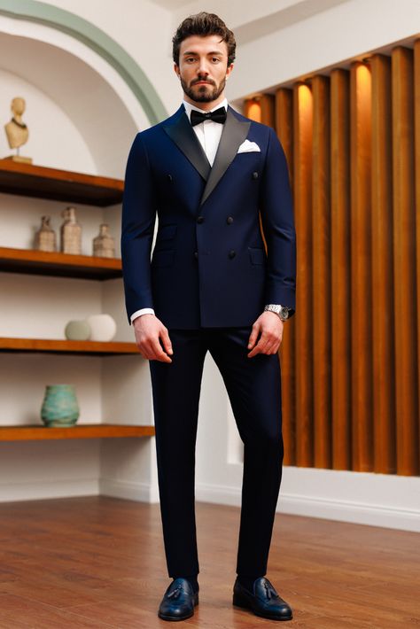 Take charge of the spotlight with our Navy Double-Breasted Tuxedo 2-Piece. The double-breasted 6-button blazer, adorned with peak lapels, paired with trousers, creates a look of timeless elegance and grandeur. Make a grand entrance at any formal affair with this exquisite tuxedo.  #navytuxedo #doublebreastedtuxedo #formalwear #tuxedo #mensfashion #specialoccasion #sophisticatedlook #formalattire #dapper Male Wedding Suit, 3 Piece Suit Men, Wedding Suits Men Black, Suit For Men Wedding, Formal Suits Men, Indian Wedding Clothes For Men, Wedding Kurta For Men, Double Breasted Tuxedo, Sangeet Outfit