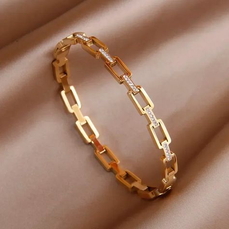 SPECIFICATIONSBrand Name: NoEnName_NullOrigin: Mainland ChinaGender: WomenMetals Type: CopperBracelets Type: Cuff BraceletFine or Fashion: fashionFunction: Mood TrackerStyle: ClassicMaterial: cubic zirconiaPlating: Gold-colorSetting Type: NoneShape\pattern: GeometricChoice: yessemi_Choice: yes Designer Gold Bracelet For Women, Gold Bracelet Patterns For Women, Bracelet Bangles For Women, Gold Bracelets For Women’s, Bangle Gold Designs, Elegant Gold Bangles, Gold Kada For Women Classy, Kada Style Bracelet For Women, Tanishq Bracelets Design