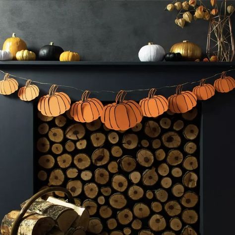 These 10 Fall Mantel Decorating Ideas Are Downright Swoon-Worthy | Hunker Fall Fireplace Mantel, Thanksgiving Party Decorations, Fall Fireplace, Giant Pumpkin, Pumpkin Garland, Halloween Garland, Pumpkin Party, Fall Mantel Decorations, Paper Garland