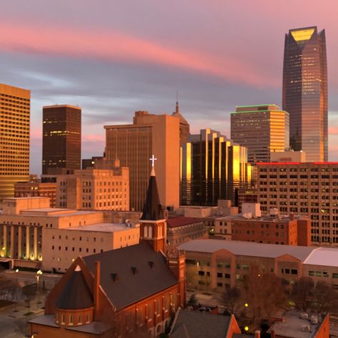 Skyline of downtown OKC at sunset Oklahoma City Aesthetic, Bricktown Okc, Downtown Okc, College List, Urban Aesthetic, City Scene, City Aesthetic, Oklahoma City, Travel Bucket List