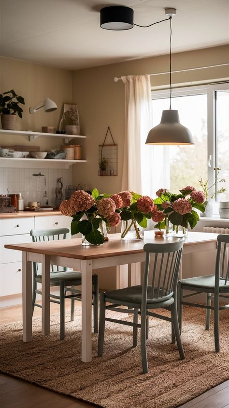 🌸 Who else believes that the dining area is the heart of the home? 🙋‍♀️ I recently transformed my space into a cozy haven, and let me tell you, it’s been a game changer! Featuring stunning hydrangeas on my Norden extendable table, paired with the charming Ingolf dining chairs, every meal feels like a special occasion. 🌿✨ The Sinnerlig pendant lamp casts the perfect warm glow, while the Stockholm rug adds a touch of softness underfoot. Did you know that hydrangeas not only brighten up your... Norden Ikea, Hygge Dining Room, Sinnerlig Pendant, Stockholm Rug, Ikea Style, Ikea Table, Extendable Table, Dining Experience, Showcase Design