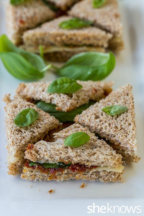 Sun-dried tomato paste, cheese & basil tea sandwich Pioneer Woman Garden Spread Finger Sandwiches, Easy Tea Sandwiches, Crunchy Toppings, Food Sandwiches, Basil Tea, Traveling In Italy, Tea Sandwich, Tea Party Sandwiches, Tea Sandwiches Recipes