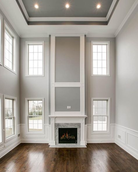 Wainscoting Ideas For Living Room Great Rooms Modern, Great Room Fireplace With Built Ins, Large Wall Artwork, Tall Ceiling Living Room, Tray Ceiling Ideas, Hampton Interior, Fireplace Accent Walls, Millwork Wall, Living Room Panelling