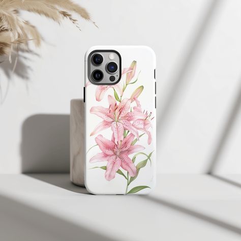 Pink Blooming Stargazer Lily Floral Trendy Aesthetic Flower Design Summer Phone Case iPhone 15, Pro, Max, Plus, 14, 13, 12, 11, X, XS, XR Double Layered durable design available in a glossy or matte premium finish. Impact-resistant, flexible material for added protection.      Supports wireless charging functionality. Polycarbonate shell & black TPU lining material. Available for iPhone models 15, 14, 13, 12, X, and more! Feel free to contact me with any inquiries before making your purchase; I'm here to help. Remember: Our items are tailored specifically upon receipt of orders, therefore, unfortunately, we cannot accommodate returns or exchanges for any products. Thank you for supporting my small business! ♡ * photos shown are examples Aesthetic Flower Design, Shifting Closet, Summer Phone, Summer Phone Cases, Stargazer Lily, Aesthetic Flower, Floral Phone Case, Trendy Aesthetic, Phone Stuff