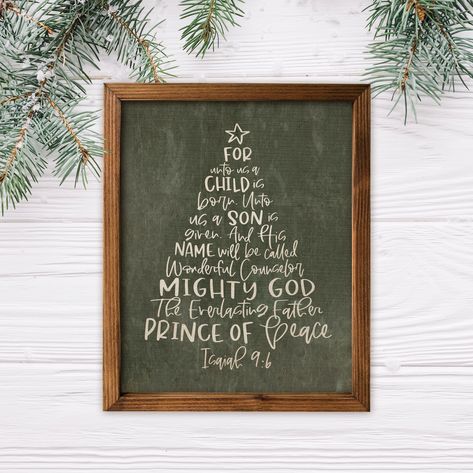 "For unto us a child is born!  A tree shaped word art on a green linen textured background. 8x10 wood framed canvas sign. A popular Christmas scripture with names of Jesus. Display this holiday sign in your home this Christmas season. Printed on 100% canvas. The frame is made of pine wood and finished with a walnut stain to enhance the natural grain. The box framed wall decor will make a wonderful gift for someone special this holiday season. Created by Made to Shine Design. SIZE:   8\" x 10\" Christmas Scripture Chalkboard Art, Canvas Signs With Cricut, For Unto Us A Child Is Born Sign, All Is Calm All Is Bright, Christmas Scripture Art, For Unto Us A Child Is Born, Christmas Sayings Signs, Diy Christmas Signs Wood, Christmas Signs And Sayings