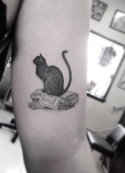 28 Examples of Small Cat Tattoos Small Book Tattoo, Tattoo Son, Tattoo Quotes For Men, Cat Tattoo Ideas, Book Tattoos, Bookish Tattoos, Skin Tattoo, Black Cat Tattoos, Cat Tat