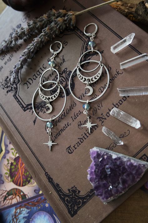 * Stunning statement Moon and Stars earrings which will give your outfit a mystical touch.  * These beautiful dangling earrings have a witchy, bohemian feel to them. * Stainless steel! * The total length of the earrings is approximately 10 cm (aprox 4 inches), hook included.  * They come in a pretty little burlap pouch 🖤 Fimo, Witchcore Earrings, Witchy Necklace, Witchy Boho, Stars Earrings, Witchy Gifts, Moon And Star Earrings, Witch Jewelry, Witchy Jewelry