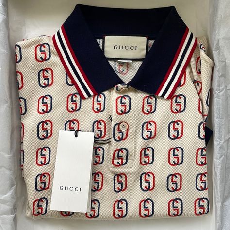 Nwt Authentic Gucci Mens Polo Stretch Cotton Piquet Size: Medium Colors: Ivory/Navy/Red Contrast Trim Interlocking G Pattern Striped Polo Collar Button-Through Placket (Extra Button In The Tags) Short Sleeves Gucci Polo Shirt, Gucci Shirts, Embroidered Polo Shirts, Mens Tshirts Fashion, Polo Shirt White, Embroidered Monogram, Cotton Polo Shirt, Gucci Men, Polo Collar