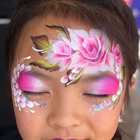 The Face Paint Shop on Instagram: "I mean, this is stunning. It could be for a wedding! Amazing.  Posted @withregram • @emmiesfacepainting Scorching last day face painting for @fairdinkumcaravans  Thanks everyone who braved the heat. ☀️  #newcastleshowground #newcastle #newy #whatsonnewcastle #summer #australia #australiansummer #facepaintau #facepaintaustralia #bodypaint #bodyart #bodypainter #facepainter #facepainting #facepaint #mua #rosefacepaint #rose #roses #princess #princesscrown #onestroke #butterfly #rainbow #mermaid #elsa #facepaintcrown #tiger #skull #facepaintskull" Face Painting Stall Ideas, Roses Face Paint, Onestroke Butterfly, Rose Face Paint, Flowers Face Paint, Flowers Face Painting, Princess Face Paint, Flower Face Paint, Face Paint Party