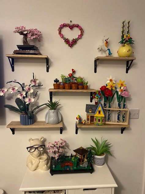 Legos In Living Room, Botanical Collection Lego, Lego Desk Decor, Cute Lego Display, Lego Wall Ideas, Lego Botanical Collection Display, Home Display Ideas, Maximalist Shelf Decor, Lego Flower Display