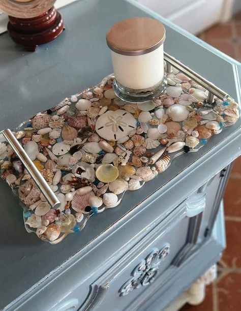 Handmade serving tray that is full of seashells that were handpicked from SW Florida beaches Beautifully set in resin and will be a great addition to your coastal home  Looks so pretty with candles set on it Measures 14 inches x 8 inches and 2 inches high with handles Epoxy Seashell Crafts, Fun Projects For Adults, Resin Shell Art, Crafts To Do With Seashells, Resin Products Ideas, Seashell Tablescape, Seashell Crafts Diy Home Decor, Sand Dollar Display, Resin Seashell Crafts