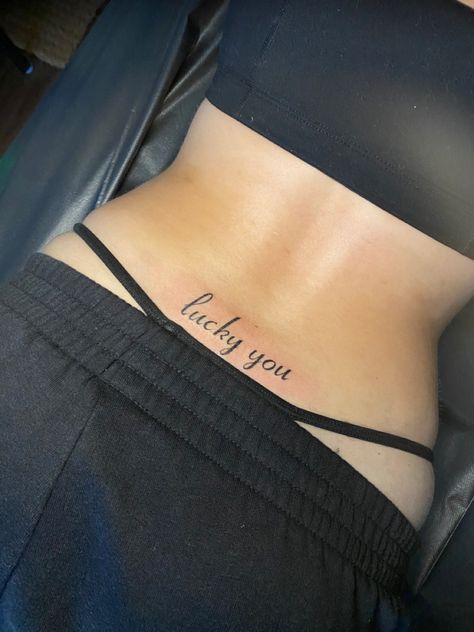 Zodiac Tramp Stamp, Lucky You Back Tattoo, Trampstamp Tattoo Aesthetic Words, Nullius In Verba Tattoo, Deftones Tramp Stamp, Heaven Sent Tramp Stamp, Tramp Stamp Aesthetic Y2k, Lucky You Tattoo Lower Back, Tramp Stamp With Words