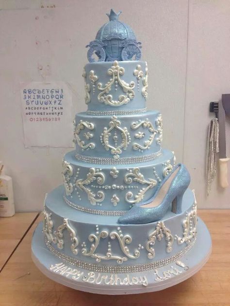 Blue and white Cinderella cake Quinceanera Cakes Blue Cinderella, Sweet 16 Cinderella Theme Cake, Cinderella Quinceanera Cake Ideas, Quince Blue Cake, Cinderella Themed Wedding Cake, Cinderella Themed Quinceanera Cake, Blue Cake Sweet 16, Blue Quince Cake Ideas, Blue Cinderella Cake