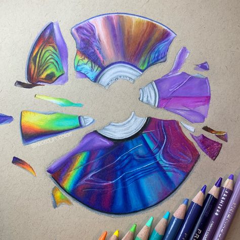 Shattered CD Drawing by @world_in_colorr using colored pencils. #art #coloredpencil Cool Coloured Pencil Drawings, Drawings Ideas Colored Pencil, Color Pencil Art Inspiration, Art Ideas Colored Pencils, Creative Colored Pencil Drawings, Things To Draw Realistic Colored Pencils, Animal Color Pencil Drawings, Colored Pencil Design, Colored Pencil Reference Photos