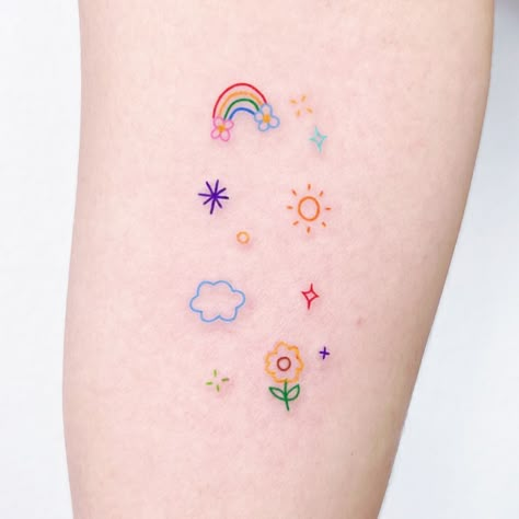 rainbow tattoo • Instagram Cute Rainbow Tattoo Ideas, Colorful Mini Tattoo, Doodle Tattoo Colorful, Cute Color Tattoos For Women, Pastel Snake Tattoo, Cute Colourful Tattoos, Sun And Rainbow Tattoo, Mini Rainbow Tattoo, Kidcore Tattoo