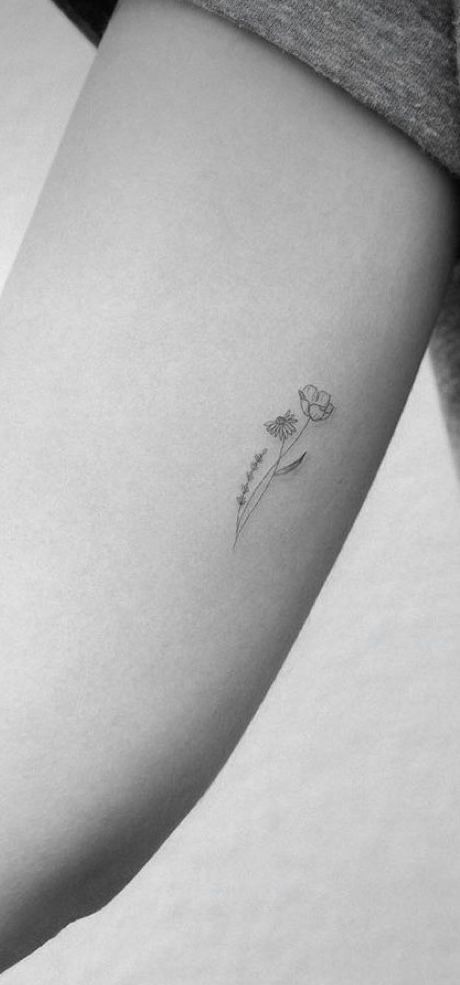 Floral Dainty Tattoo, Subtle Flower Tattoo, Small Flower Tattoos On Arm, Birth Flower With Initial Tattoo, Flower Tattoo Simple Minimalist, Tattoos To Get For Your Sister, Small Dainty Daffodil Tattoo, Birth Flower Tattoos Simple, Buttercup Flower Tattoo Simple