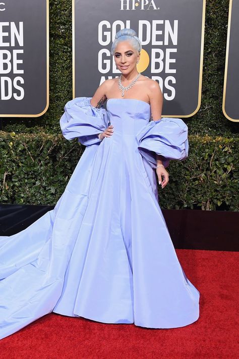 Lady Gaga is one of our top 11 best-dressed celebrities from the opening night of award season. See all of the evening’s most standout gowns. The A Star is Born’ nominee is a show-stopper in a custom periwinkle Haute Couture gown created by Valentino Creative Director, Pierpaolo Piccioli—featuring balloon sleeves, an endless train, and a strapless silhouette. Ellie Saab, Haute Couture, Best Dressed Celebrities, Pierpaolo Piccioli, Golden Globes Red Carpet, Haute Couture Gowns, Couture Gown, Awards Night, Valentino Couture