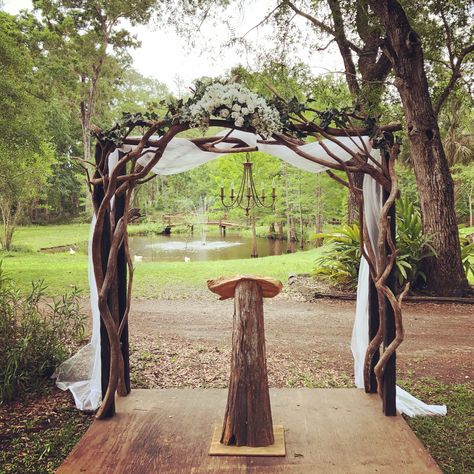 There are so many ways to decorate Cypress Creek’s rustic ceremony arch! Tree Arch Wedding Ceremony, Twig Wedding Arch, Tree Wedding Arch Outdoor Ceremony, Stone Arch Wedding, Celtic Wedding Arch, Lotr Wedding Arch, Wedding Arch With Branches, Pagan Wedding Arch, Natural Wood Wedding Arch