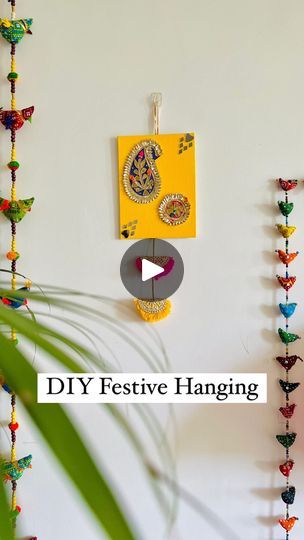 84K views · 1.8K reactions | DIY Festive Hanging ✨

Made this easy 10min Diwali hanging 2 yrs ago and love how it turned out. So resharing it again❤️

Things required: 
1. Canvas board or cardboard 
2. Gotta patti cutouts and lace
3. Tape and fevi bond 
4. Craft Mirrors 
5. Acrylic colors 

✅ Please SHARE with your friends & SAVE for future reference 😊
.
.
.
.
.
.
 #diyhomedecorideas #diyhomedecor #diytutorial #diydecor #diwalidecor #diwali  #diy #diwalidecorations #navratri #diyreels #indianfestival #5mincrafts 
#indianhomedecor #indianhome 
#explorepage  #diyideas 
#homedecor #viralreels #walldecor #homedecorideas #trending #trendingnow 
#trendingreels #reelsinstagram #reelsindia #wallhanging  #viralvideos #indiandecor 

( diy crafts , diy home decor, home decor diy ideas , festive diy Diy Diwali Decorations At Home, Diwali Decorations At Home, 5 Min Crafts, Diy Diwali Decorations, Diwali Craft, Diwali Diy, Festival Diy, Indian Festivals, Diwali Decorations