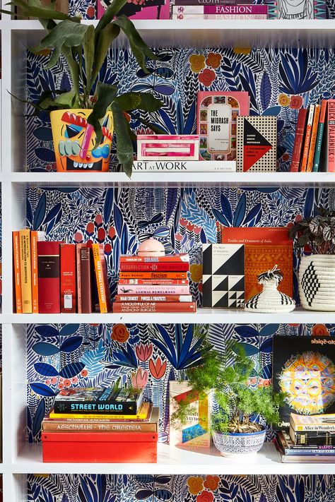 Maximalist Built In Shelves, Bookshelves Painted Inside, Bookcase Styling Maximalist, Knick Knack Display Ideas Living Rooms, Wallpaper Shelves Bookshelves, Wallpaper Backed Shelves, Wallpaper Behind Shelves Living Room, Maximalism Shelves, Wallpaper Back Of Bookshelf